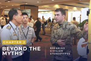 Three men in military uniforms converse at a conference or expo, with bold overlays: 'Chapter 2: Beyond the Myths' and 'Breaking Civilian Stereotypes'.